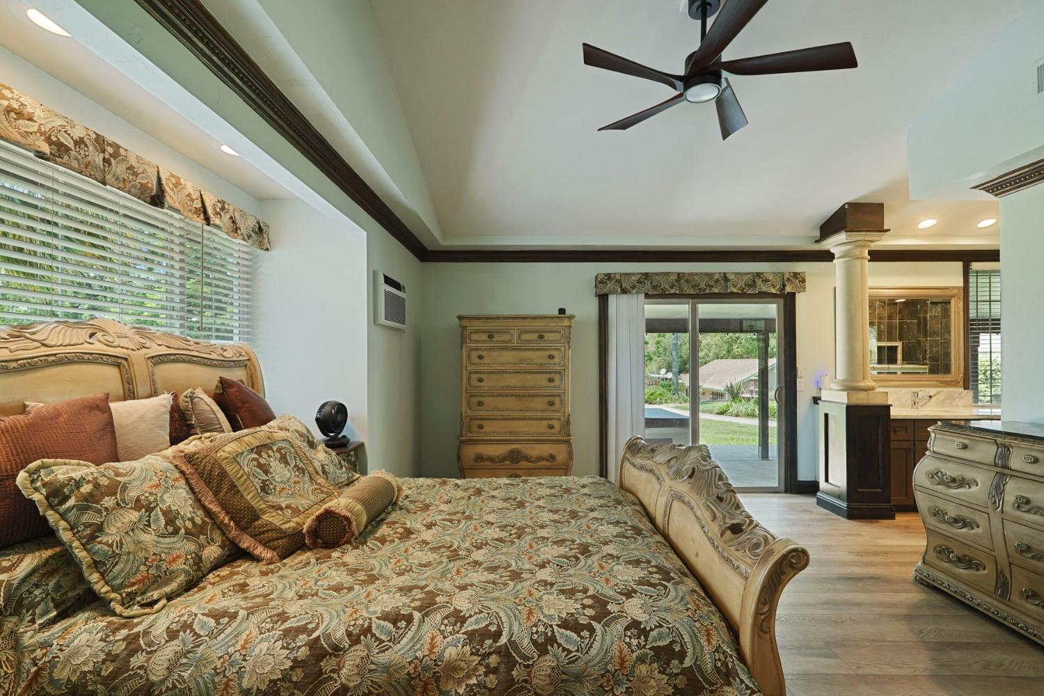 5407 Butler Road Penryn, CA 95663 - Photo 20 of 69 a bedroom with a large bed and a window