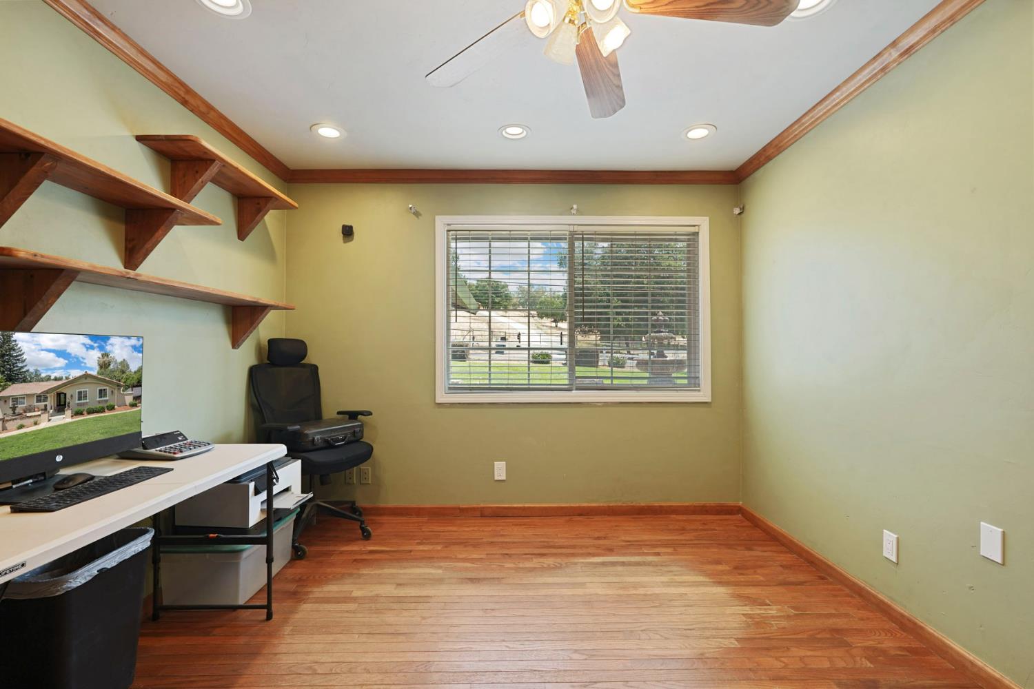 5407 Butler Road Penryn, CA 95663 - Photo 26 of 69 a view of workspace with wooden floor and windows