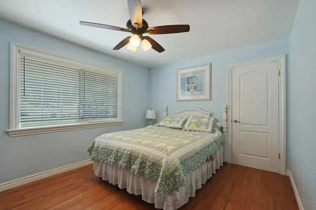 a kitchen with a refrigerator and sink