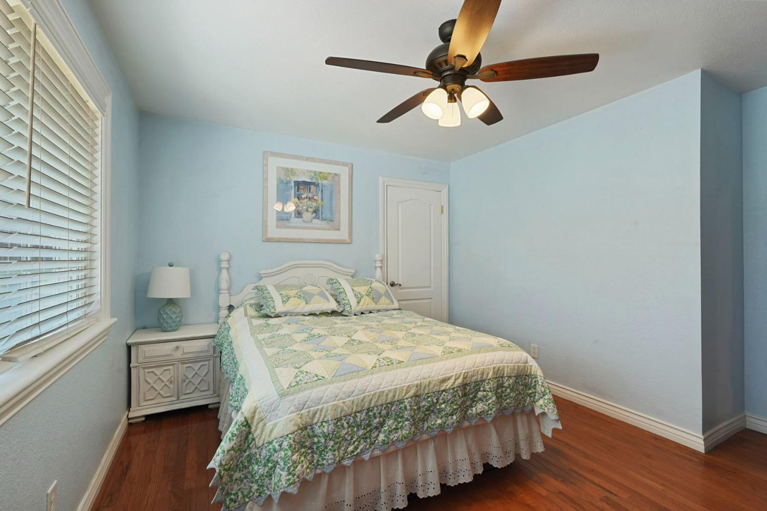 5407 Butler Road Penryn, CA 95663 - Photo 29 of 69 a bedroom with a bed a dresser and a window