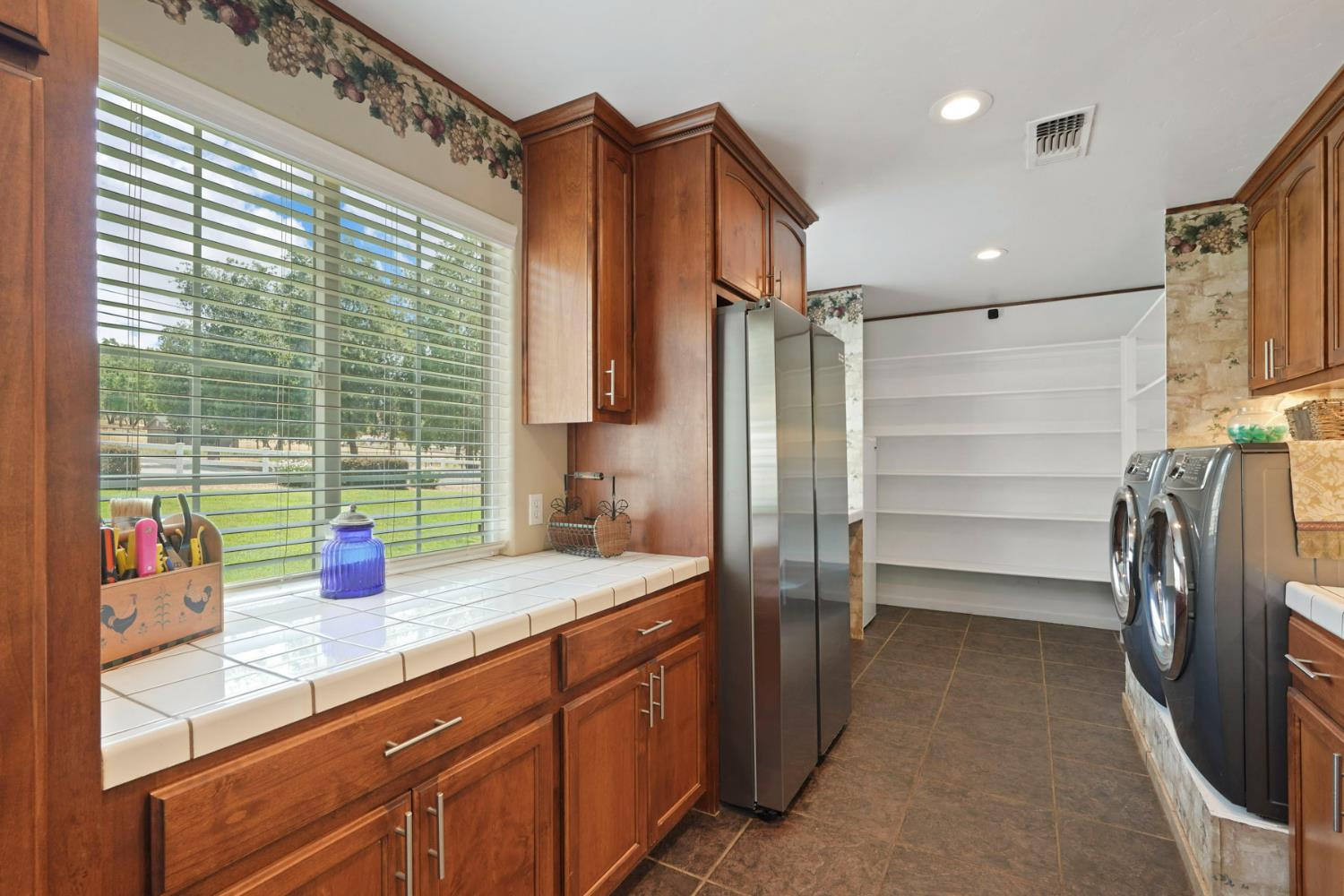 5407 Butler Road Penryn, CA 95663 - Photo 30 of 69 a kitchen with a refrigerator and sink