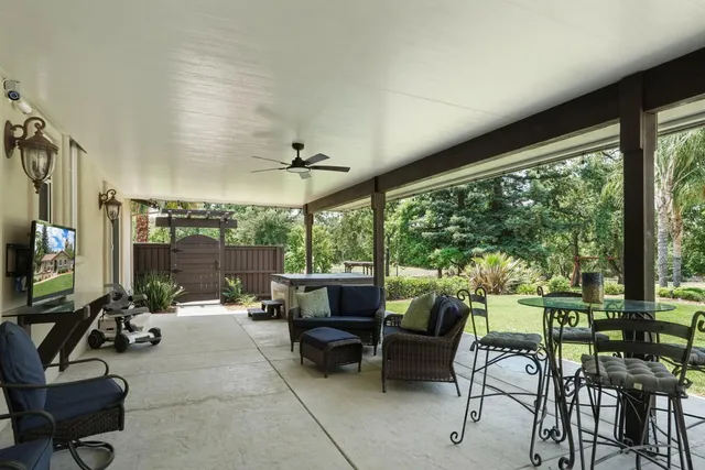 a view of house with outdoor space and entertaining space