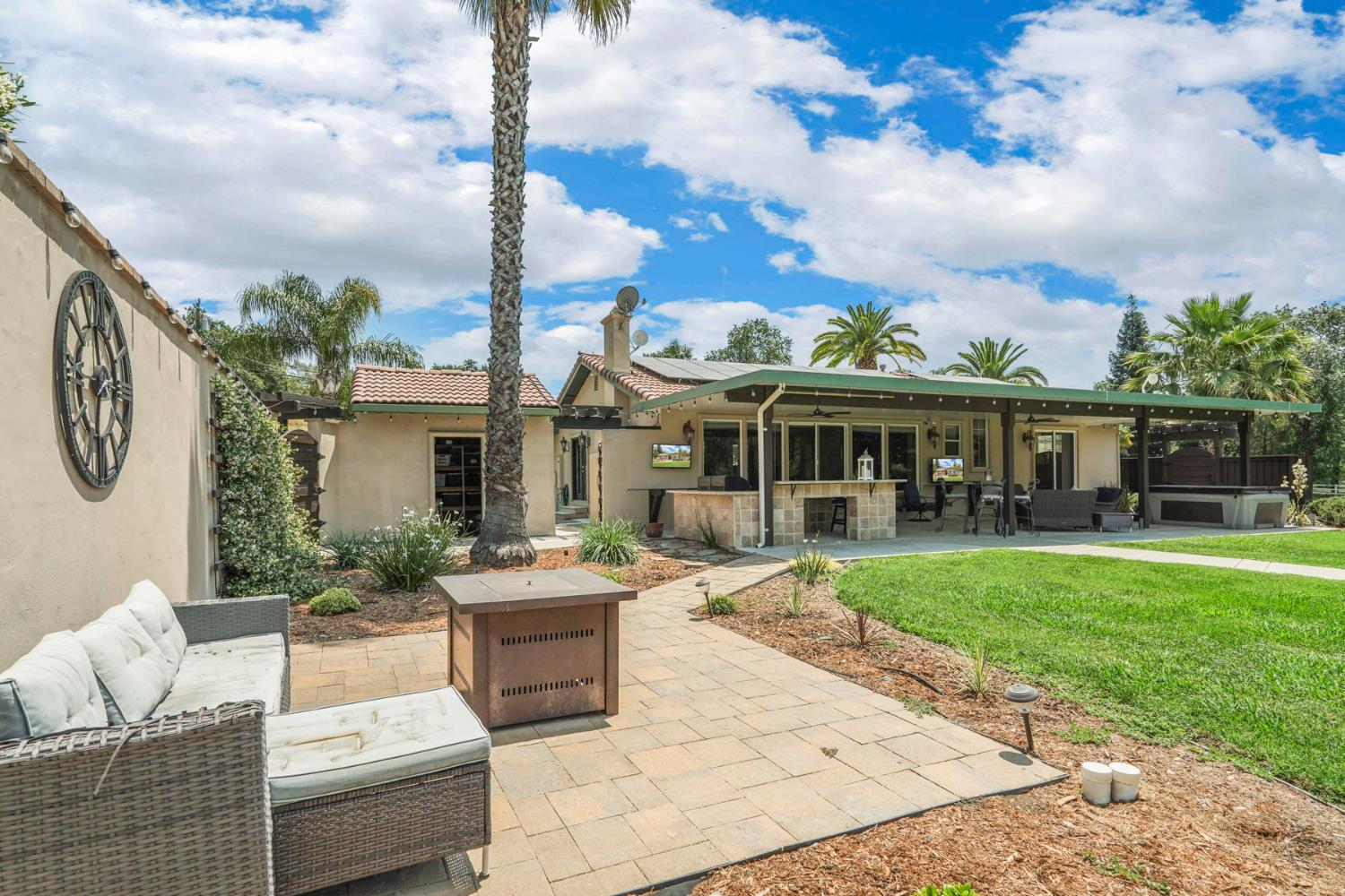 5407 Butler Road Penryn, CA 95663 - Photo 36 of 69 a view of a house with couches chairs and a yard