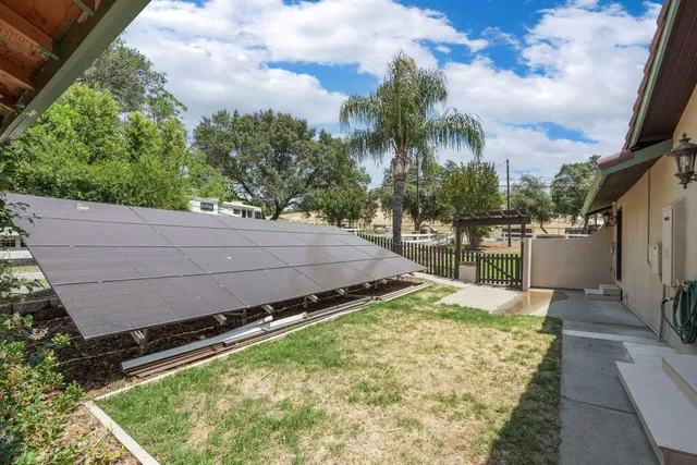 a utility room with sink dryer and washer