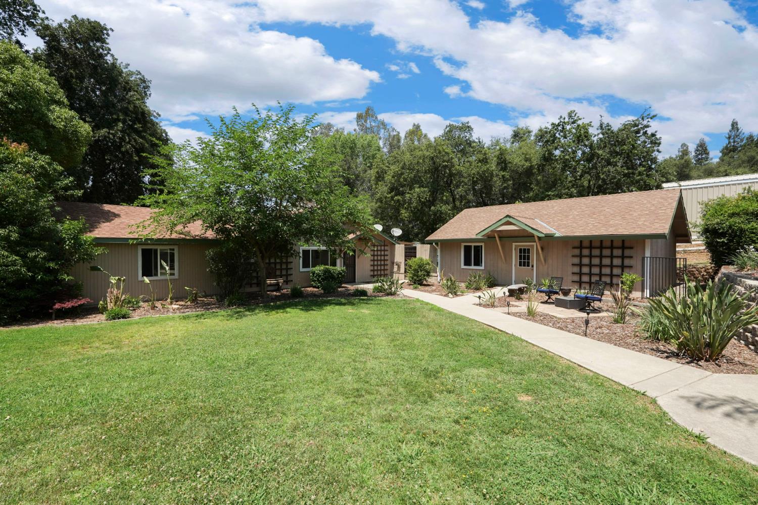 5407 Butler Road Penryn, CA 95663 - Photo 41 of 69 a front view of a house with yard porch and furniture