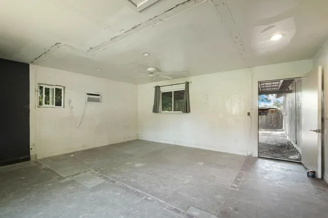 an aerial view of multiple houses with yard