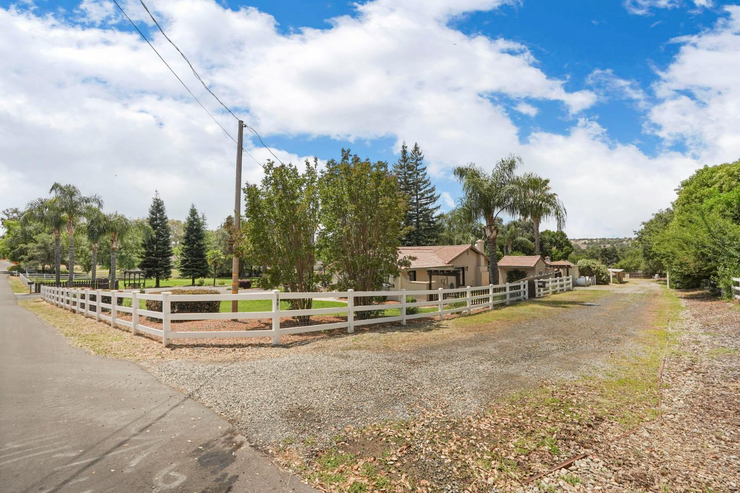 5407 Butler Road Penryn, CA 95663 - Photo 55 of 69 a view of a swimming pool with lawn chairs and tables
