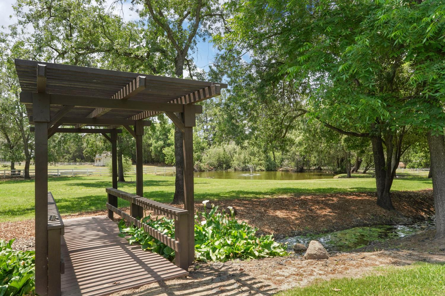 5407 Butler Road Penryn, CA 95663 - Photo 59 of 69 a view of a sink and backyard with large trees
