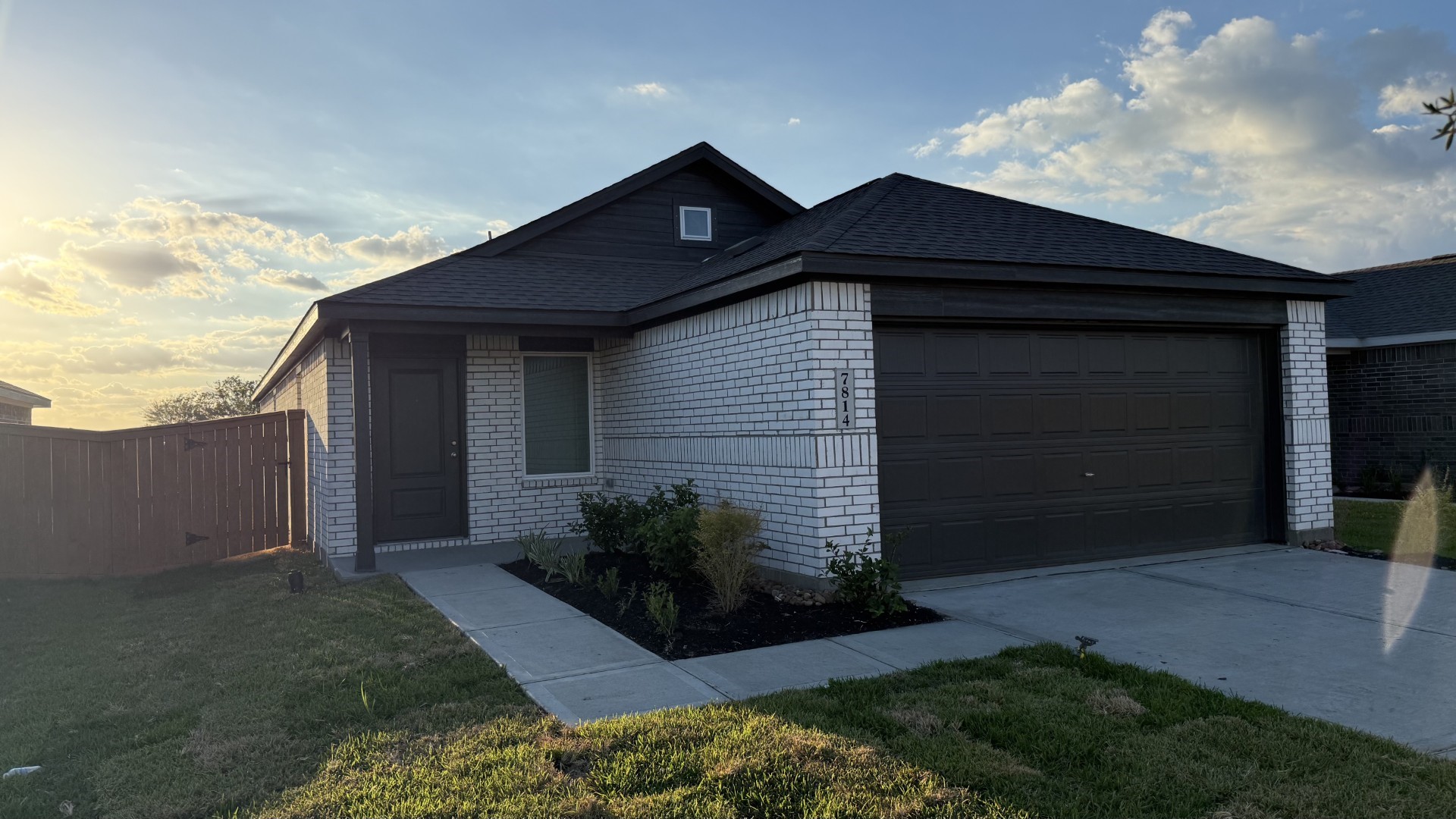2422 Rose Gold Drive Rosharon, TX 77583 - Photo 2 of 23 a front view of house with yard and trees in the background