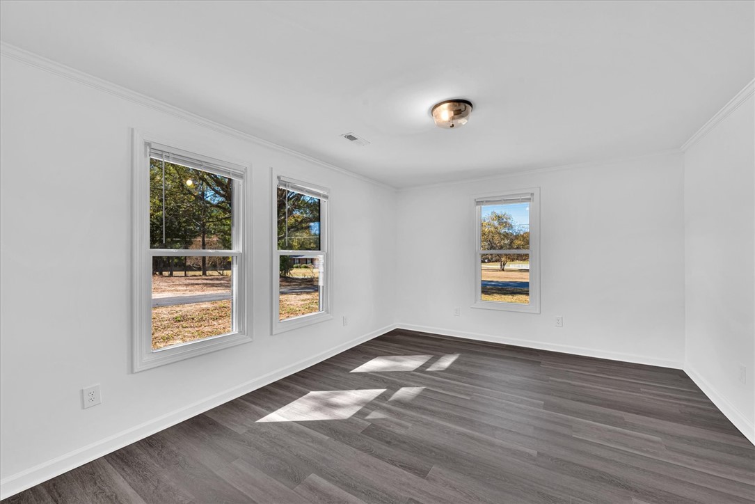 801 Cherokee Road Pelzer, SC 29669 - Photo 21 of 45 This bright room features a spacious layout with ample natural light.