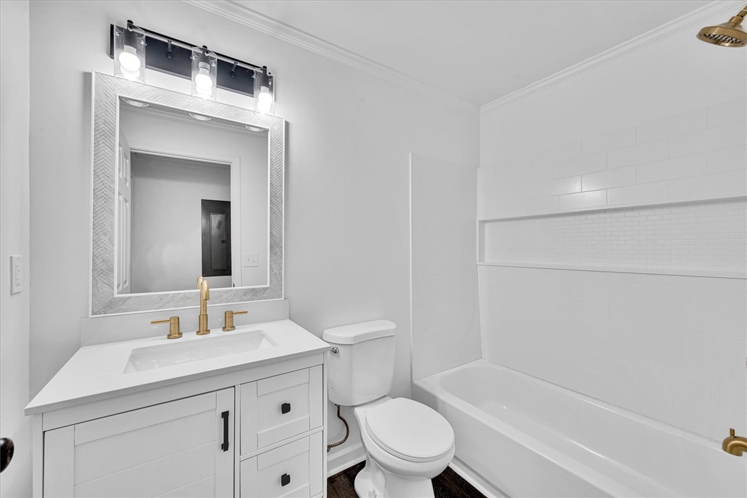 801 Cherokee Road Pelzer, SC 29669 - Photo 24 of 45 Bright and clean, this bathroom features a sleek vanity and a contemporary tub with subway tile surround.