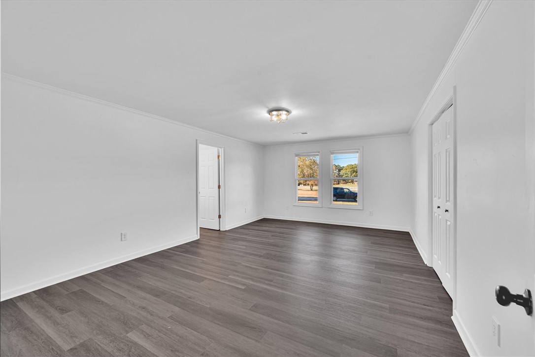 801 Cherokee Road Pelzer, SC 29669 - Photo 25 of 45 This bright and airy room features sleek flooring and ample natural light, perfect for any design vision.