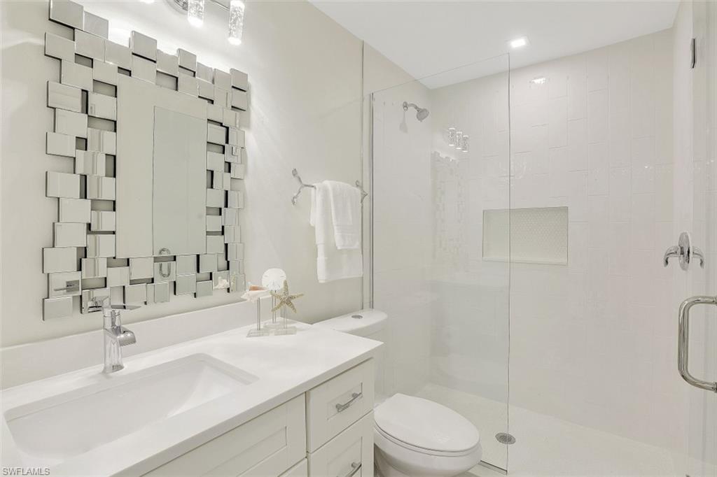 4004 Crayton Road Naples, FL 34103 - Photo 17 of 29 Guest bathroom