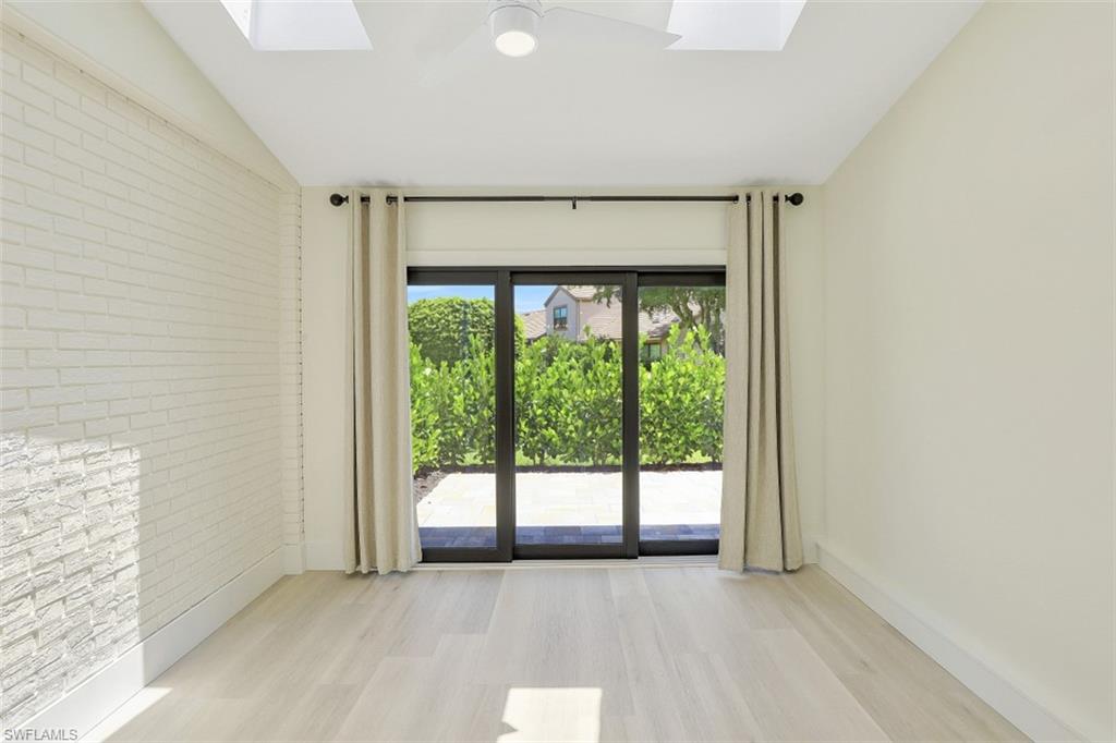 4004 Crayton Road Naples, FL 34103 - Photo 19 of 29 Florida room with French doors at entrance.