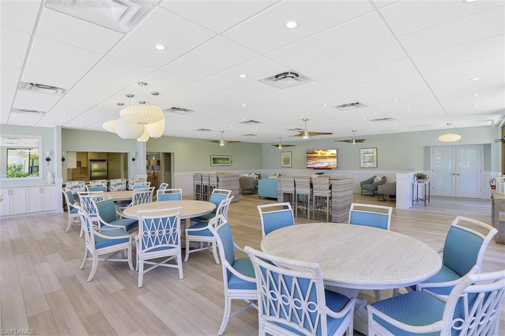 4004 Crayton Road Naples, FL 34103 - Photo 26 of 29 Recently renovated community room and kitchen.