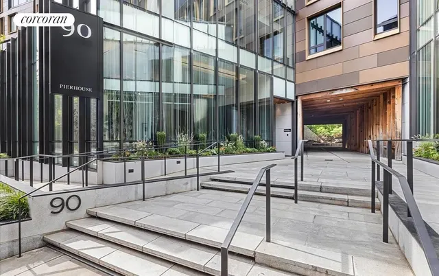 a view of an chairs and table in a room