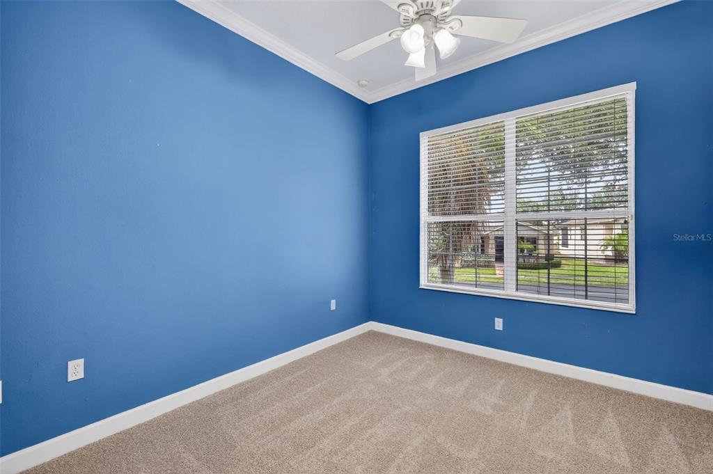 2117 Appalachee Circle Tavares, FL 32778 - Photo 20 of 30 a view of an empty room with a window