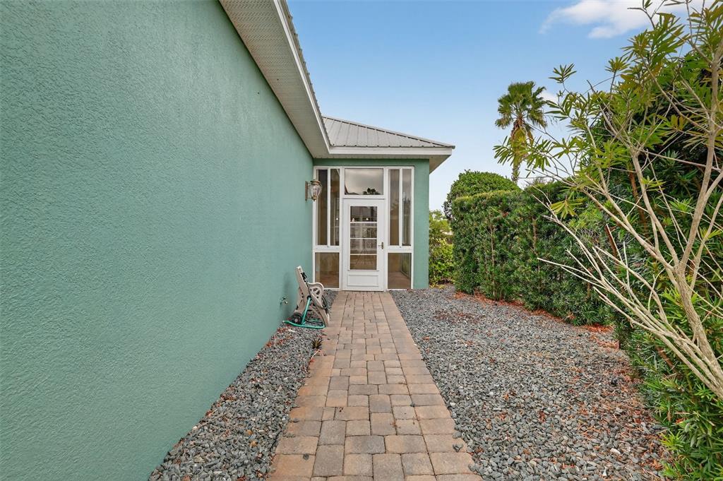 2117 Appalachee Circle Tavares, FL 32778 - Photo 25 of 30 a front view of a house with a yard