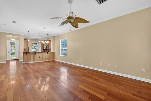 a kitchen with a sink stove and refrigerator
