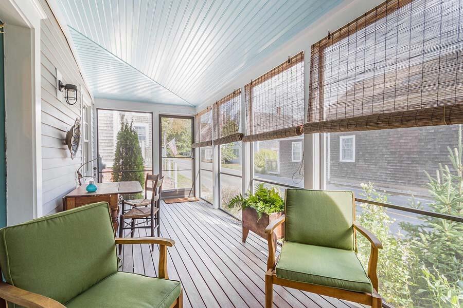 180 Commercial Street Wellfleet, MA 02667 - Photo 29 of 41 a living room with furniture and a large window