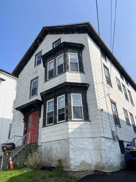 503 William Street Fall River, MA 02721 - Photo 1 of 19 a front view of a house
