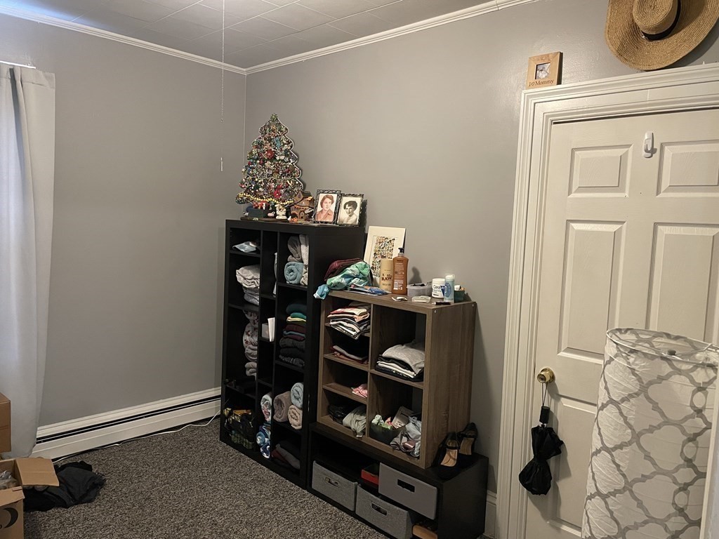 503 William Street Fall River, MA 02721 - Photo 12 of 19 a bedroom with a bed and a window