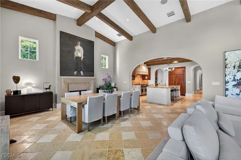 a kitchen with stainless steel appliances granite countertop a stove and cabinets