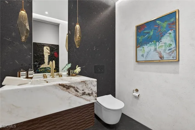 a view of a swimming pool with sitting area