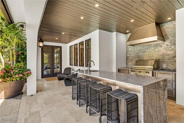 an aerial view of a house with a yard and a garden