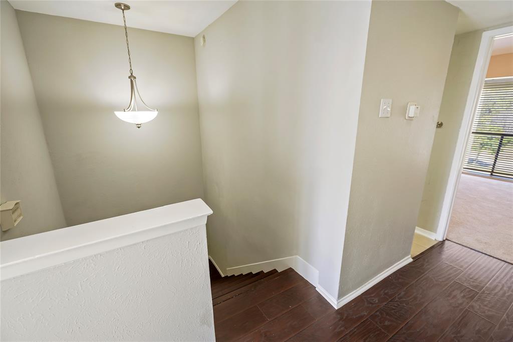 4523 North O'Connor Road, Unit 1177 Irving, TX 75062 - Photo 25 of 31 a view of a room with wooden floor