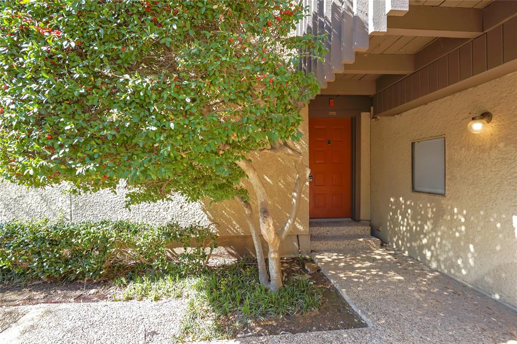 4523 North O'Connor Road, Unit 1177 Irving, TX 75062 - Photo 3 of 31 a view of a house with a tree