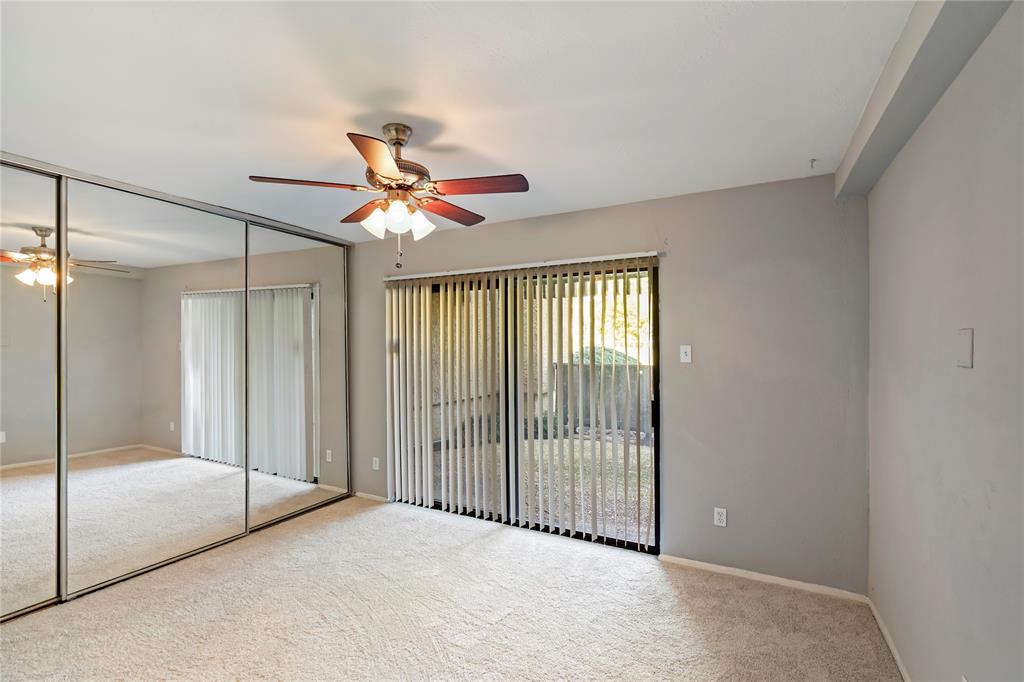 4523 North O'Connor Road, Unit 1177 Irving, TX 75062 - Photo 10 of 31 a view of a livingroom with a ceiling fan and shower