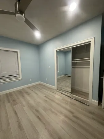 a view of an empty room and window