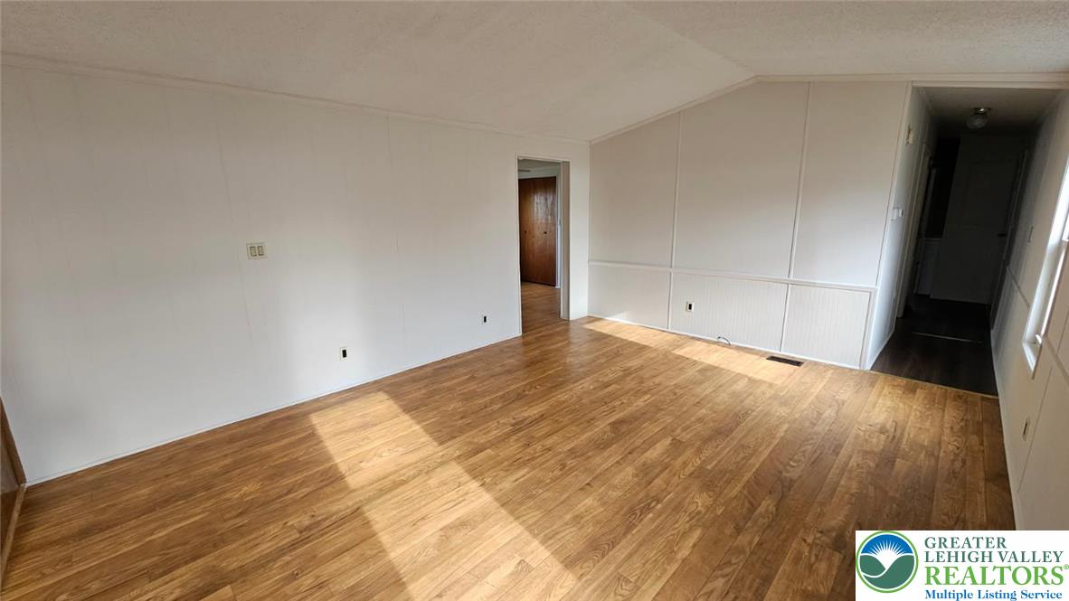 222 Independence Way Mount Bethel, PA 18343 - Photo 12 of 33 a view of empty room with wooden floor