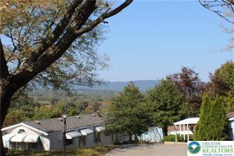 222 Independence Way Mount Bethel, PA 18343 - Photo 5 of 33 a view of a town with barn house in the background