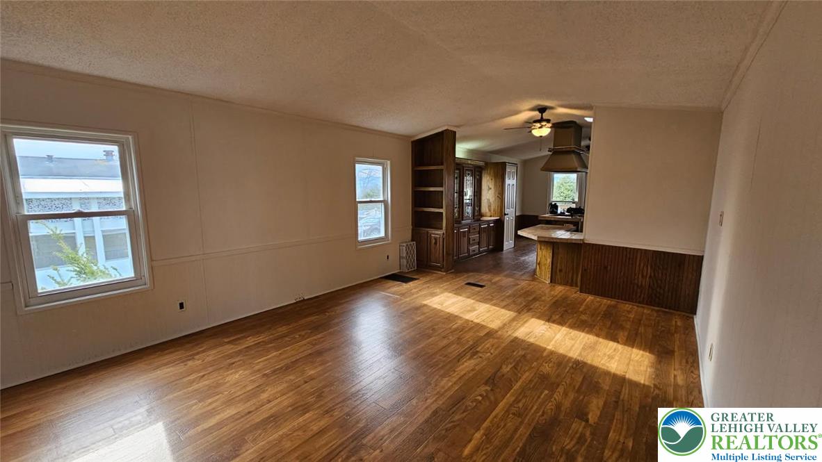 222 Independence Way Mount Bethel, PA 18343 - Photo 9 of 33 wooden floor in an empty room with a window