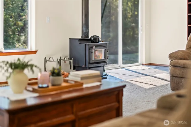 a dining room with table and chairs