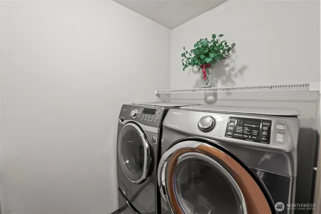 a utility room with dryer and washer