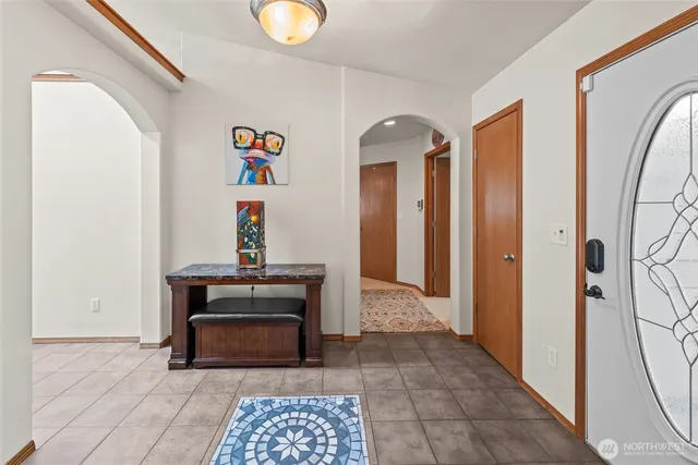 a view of an entryway with a rug