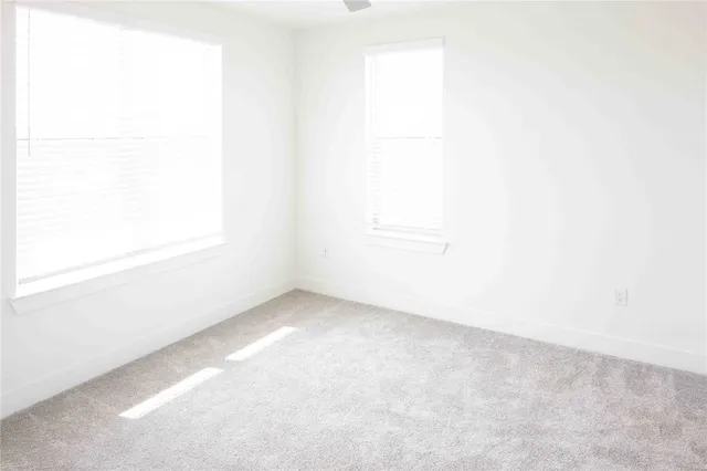 a view of a small space with wooden floor