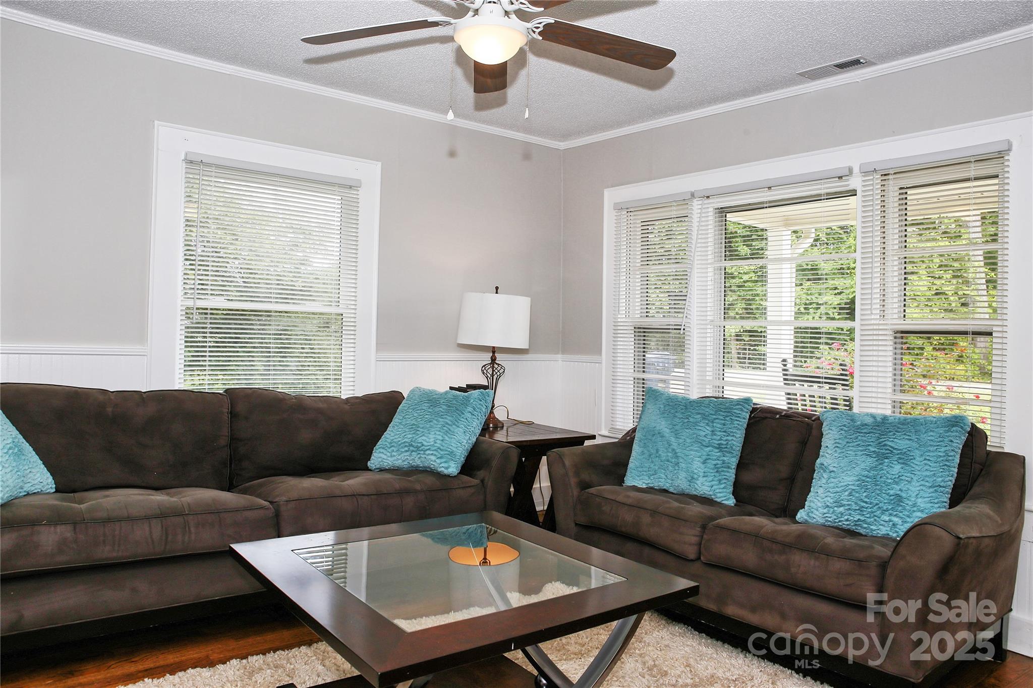 218 Blacksnake Road Stanley, NC 28164 - Photo 12 of 36 a living room with furniture and a large window