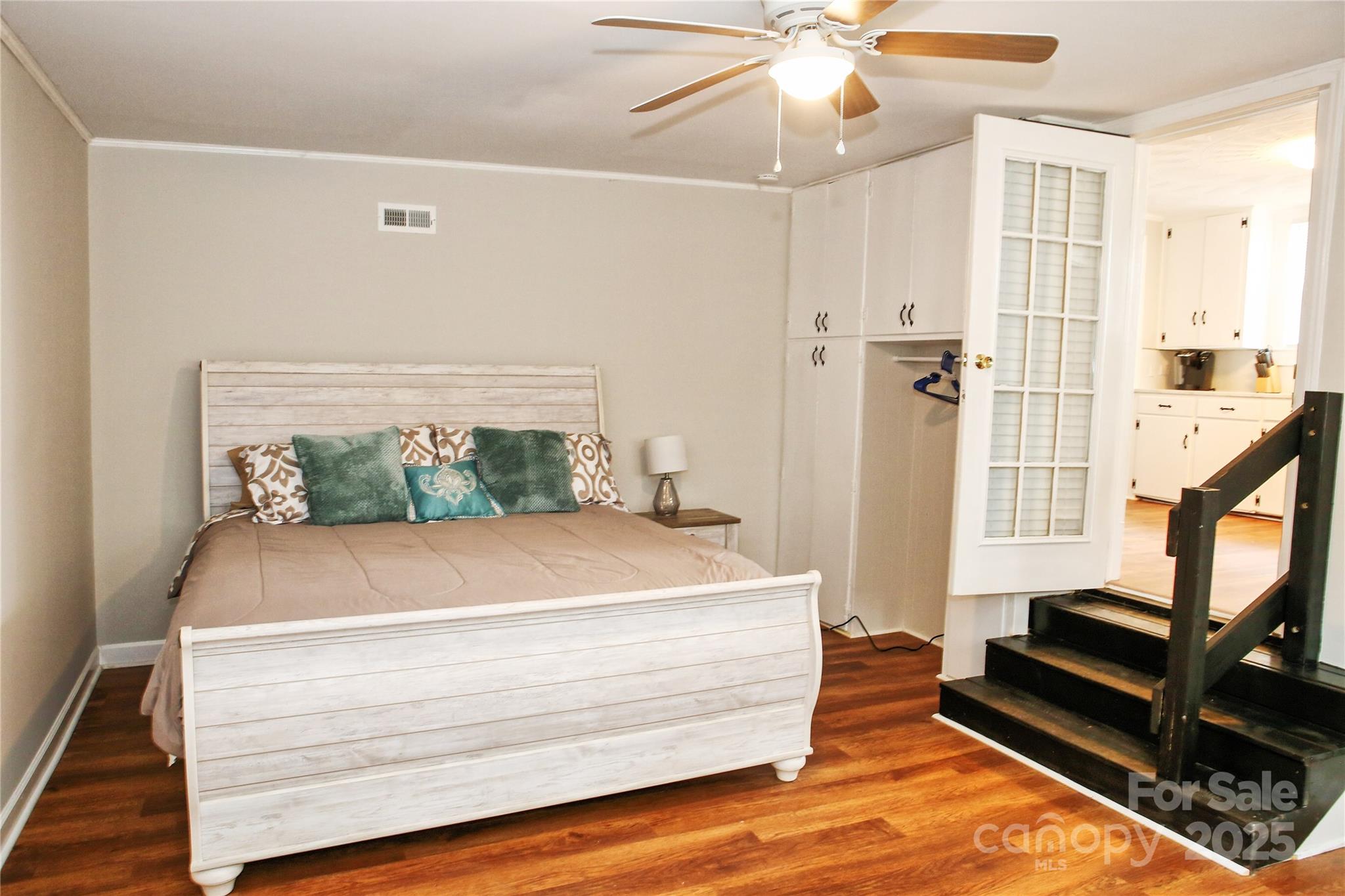 218 Blacksnake Road Stanley, NC 28164 - Photo 19 of 36 a room with wooden floor and white walls