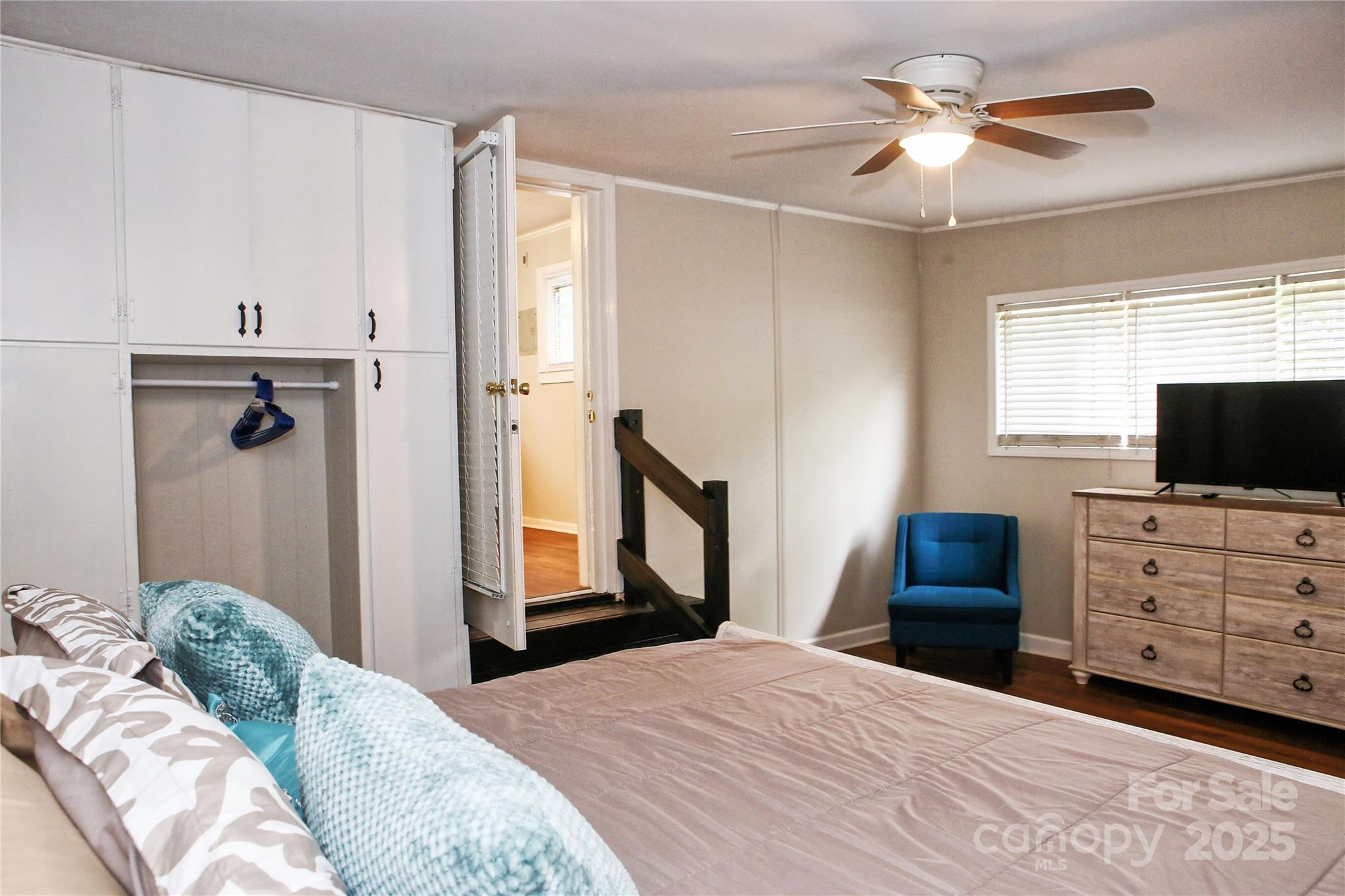 218 Blacksnake Road Stanley, NC 28164 - Photo 20 of 36 a bedroom with a bed and a flat screen tv