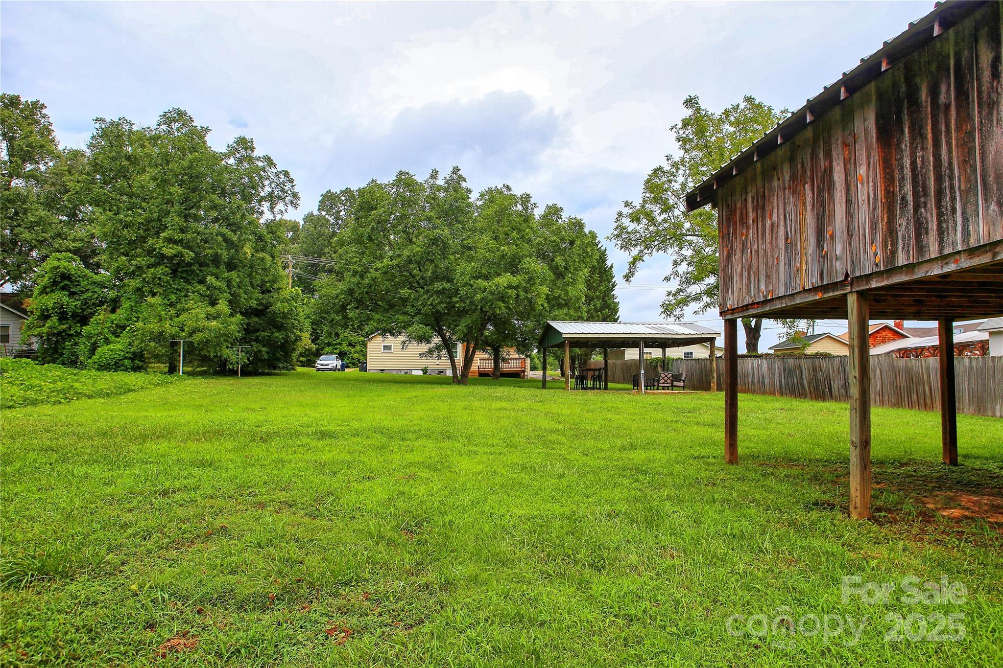218 Blacksnake Road Stanley, NC 28164 - Photo 7 of 36 a view of a house with backyard