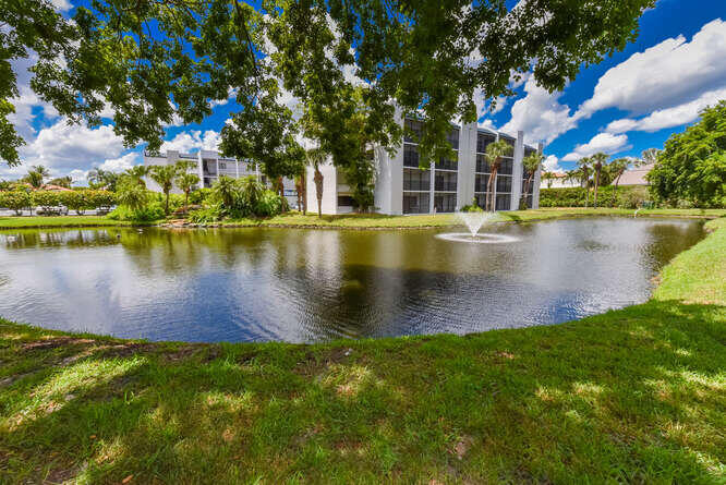 1605 Highway 1, Unit B105 Jupiter, FL 33477 - Photo 27 of 30 a view of a lake with houses in front of it
