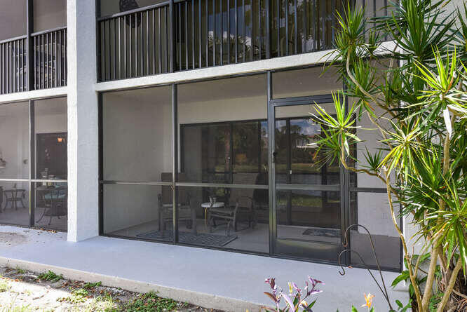 1605 Highway 1, Unit B105 Jupiter, FL 33477 - Photo 28 of 30 a view of outdoor space with seating area