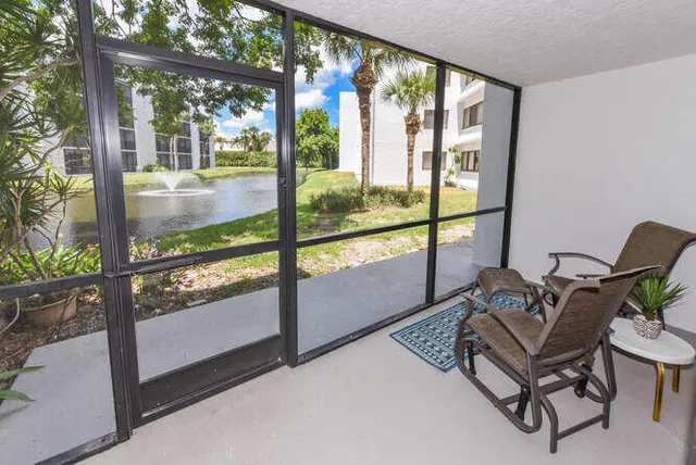 a view of a room with a large window