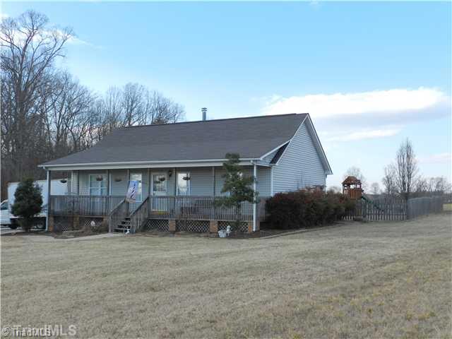 1957 Sandy Ridge Road Colfax, NC 27235 - Photo 1 of 15 Exterior Front.