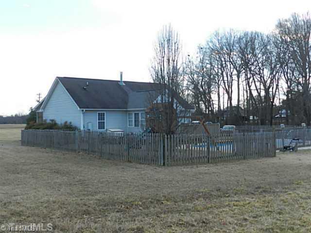 1957 Sandy Ridge Road Colfax, NC 27235 - Photo 12 of 15 Exterior Back.