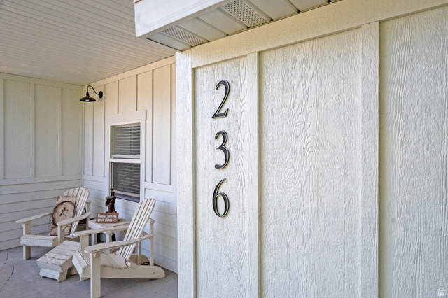 236 West 300 South Hurricane, UT 84737 - Photo 70 of 76 Front entry featuring vertical board and batten style siding and house numbers